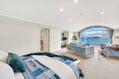 The blue bedroom has a stunning view looking across the Harbour to North Head. There is some construction happening; please see other photos for the updated view.