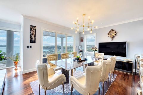 The dining room is a lovely space with a wide-screen TV for the diners to use. There is some construction happening; please see other photos for the updated view.