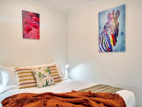 Feel at home and comfortable in this decorated bedroom enough to kick back and rest.