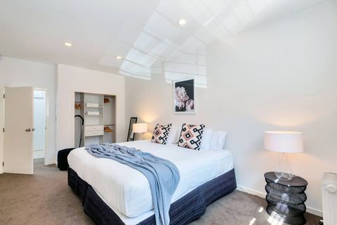 The first bedroom has a King-sized bed with plenty of closet space to store your clothes and luggage.