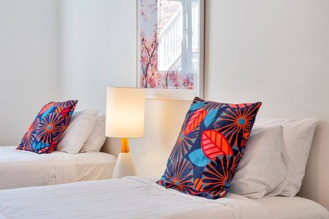 The second bedroom is perfect for children or restless sleepers! It is light and bright, with little splashes of colour to keep the vibe relaxing and restful.