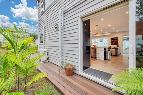 Viewing into the kitchen and living area. Walk around to the BBQ and outdoor dining.