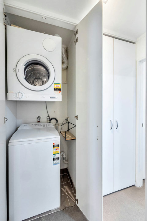 There is a handy washing machine and dryer in the apartment.
