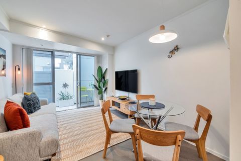 The open-plan living area opens onto a petite private courtyard.