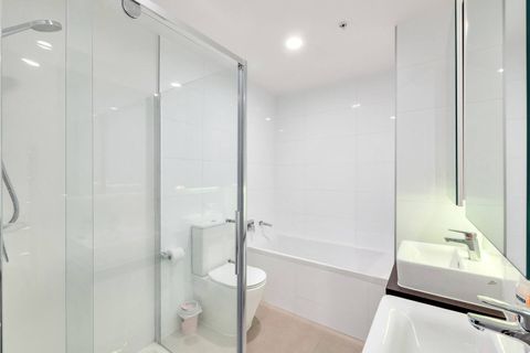The main bathroom is large and generously appointed with a separate shower and bathtub, twin sinks, and a toilet. This bathroom has everything you need in a family bathroom. Ventilated and pristinely clean.