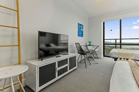 You can lie in bed and watch TV or stream your own Netflix movies.