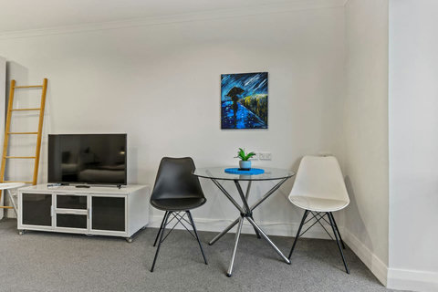 A table is always useful to eat together or play a card game.