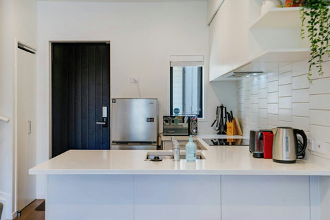 Enter the home through the back door straight into the kitchen.