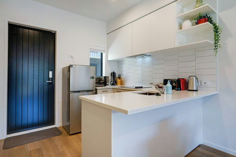 There is plenty of prep space in the kitchen to be able to cook meals.