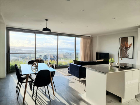 The dining room seats six, and there is plenty of room for you to spread out to the breakfast bar at the kitchen island and the lounge.