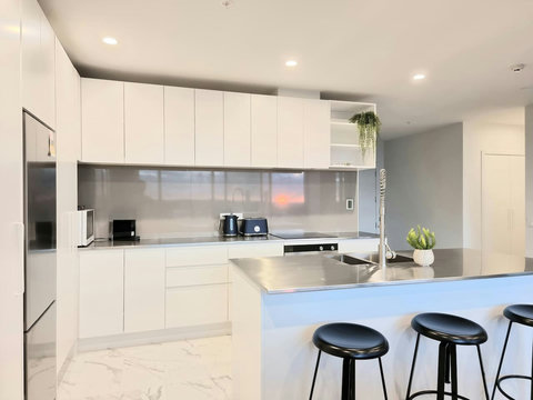 There is plenty of storage with upper cabinets and a large pantry.