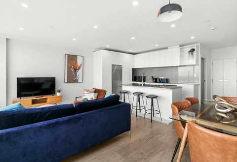 Open-plan living, dining and kitchen areas make the space feel large.