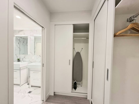 The large wardrobe in the main bedroom has plenty of storage.