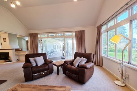 Open the French doors to enjoy the indoor/outdoor flow to the patio area.