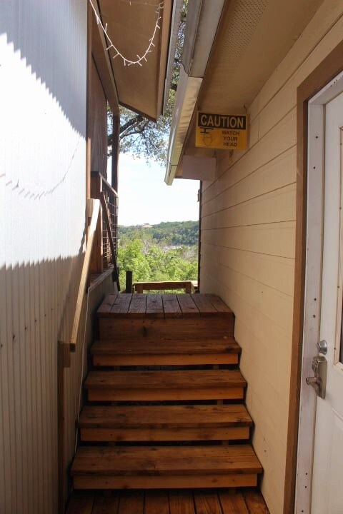 this is the closest the two units ever get, the walkway is yours private. No adjoining walls. Sounds are really never a problem. 

Main house on left, cabin on right. 
