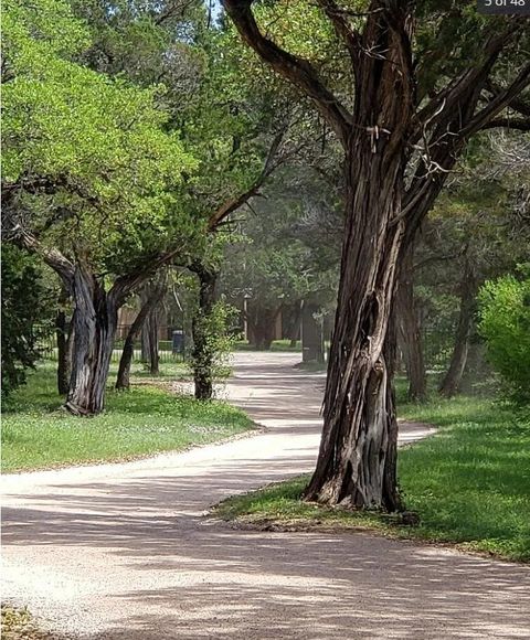 Long Driveway in to property.  About 6 acres, well into the water too. We usually keep higher flowers as we love the nature. 