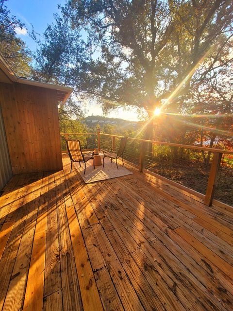 Old photo before all the furniture-, but love that it shows our sunsets over the hills. 