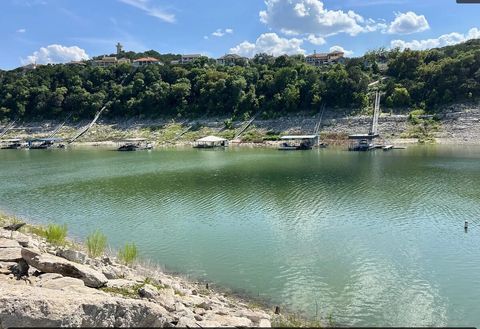 Lake Pre-Flood (more of a rocky sloped entry, but still nice and not hard)  Water shoes always recommended though! 

Our Lakefront access looking across the lake at Lago Vista. Natural Slope to water and Dock ( Just acquired, not yet pictured) 