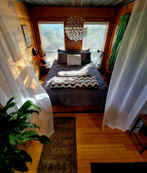 brand new QUEEN bed added for 2026

Number 1 requested change \ upgrade for the cabin. 
disregard the double in any other pictures until we get new photos of everything. 

Big plant, huge mirror, dartboard,  larger TV all added recently April '26