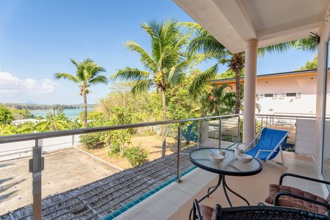 Experience the serenity of a beautiful garden, breathtaking sea view, and the added convenience of complimentary secured parking below.