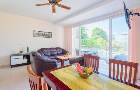Stylish dining space and comfortable living room, ideal for delightful mealtime gatherings.