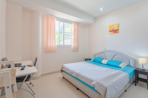 1st bedroom. To the left, there is a bathroom.