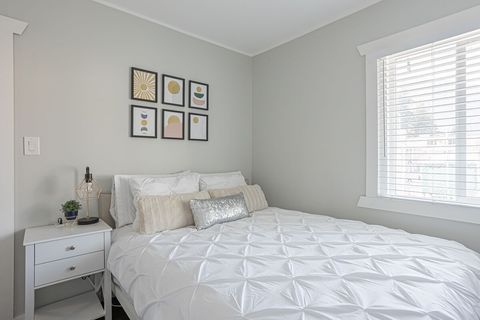 Relax in the queen bed with a plush, pillow top mattress after a long day exploring Hope BC.