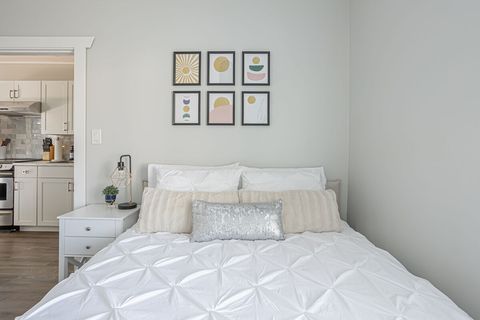 Relax in the queen bed with a plush, pillow top mattress after a long day exploring Hope BC.