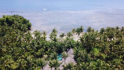 Direct access to an almost private beach, completely secluded at high tide.