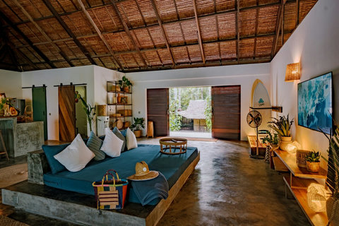 Open-plan space with a 7-meter-high artisanal nipa ceiling 