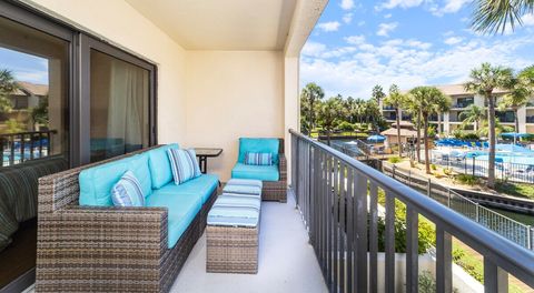 Sit on the comfy couch and overlook the heated pool surrounded by a lagoon with koi fish swimming while having your morning coffee.