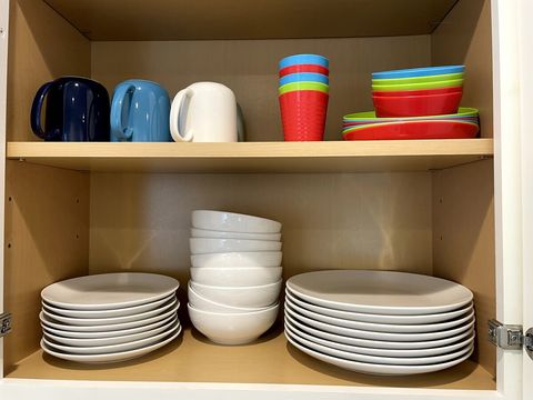 Ready to serve the adults and kids with the plates, bowls, cups, wine glasses, juice glasses, silverware, etc.