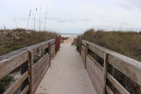 Boardwalk from the pool directly to the beach.