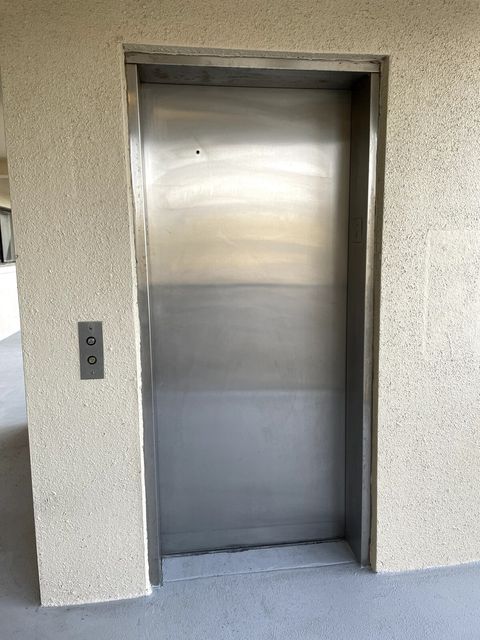 Elevator access just steps away from the front door entrance.