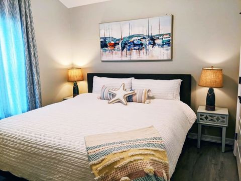 Second bedroom with king size bed and smart TV