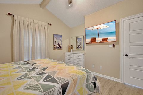 Master bedroom with king bed and 55 inch Smart TV