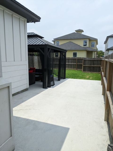 Expanded back patio (April 2022).