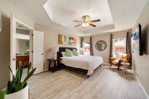 Unwind in the large master suite with king bed and 65 inch smart TV.