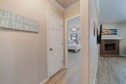 Master bedroom and guest rooms on the opposite sides of the home.