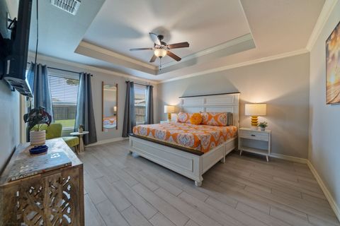 Snuggle in, start counting sheep, and drift off to dreamland in the master bedroom's cozy king bed with luxurious linens.