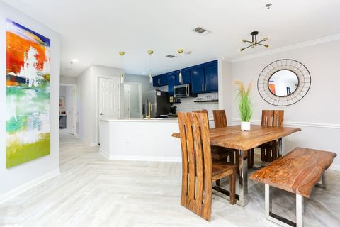 Solid mango-wood dining table seats 6 comfortably.
