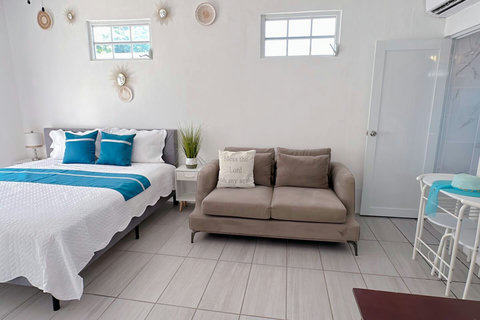 First Floor Master Bedroom: Bright and airy retreat with serene decor and plush furnishings!