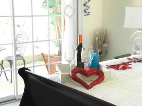 First floor bedroom with backyard pool view