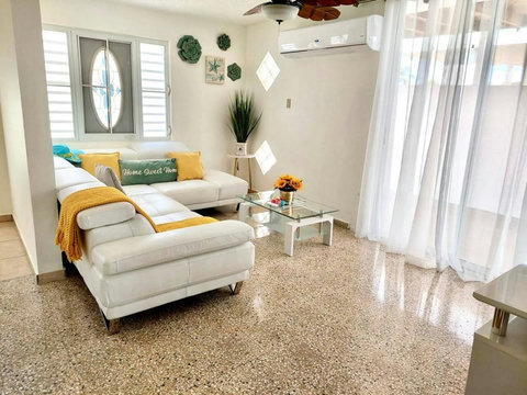 Living Room: Bright and airy space with chic decor, perfect for relaxation and vibrant gatherings!