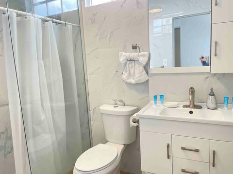 Bathroom: Sleek marble finishes and modern fixtures create a perfect retreat for relaxation!