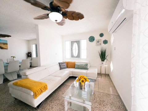 Living Room: Bright and airy space with chic decor, perfect for relaxation and vibrant gatherings!