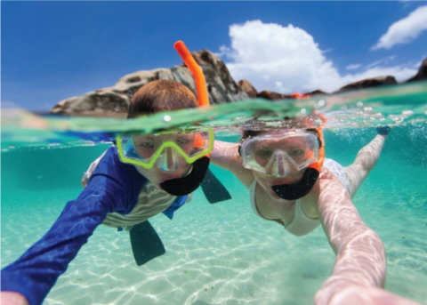 Underwater Adventure: Dive into vibrant reefs teeming with colorful marine life!