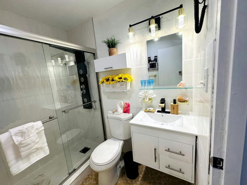 Bathroom Oasis: Elegant shower features and chic decor await your refreshing retreat!