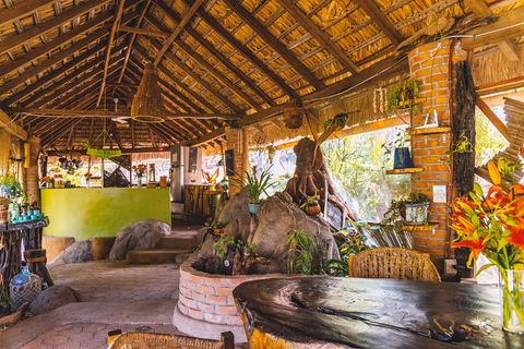 Hide from the sun and work on your laptop from the dining room.  With the fan on its one of the coolest spots on the property midday. Hard to beat the pool, but this is close to the fridge and the bar, so there's that.