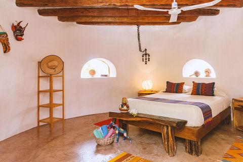 First floor of The Cone with palapa roof and private terrace. Floor and walls are cool to the touch making for a very comfortable space. Simple but usable spaces to unpack and settle in.